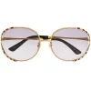 Gucci Eyewear 002 GOLD GOLD GREY Lunettes De Soleil à Monture Ronde Rayée Femme