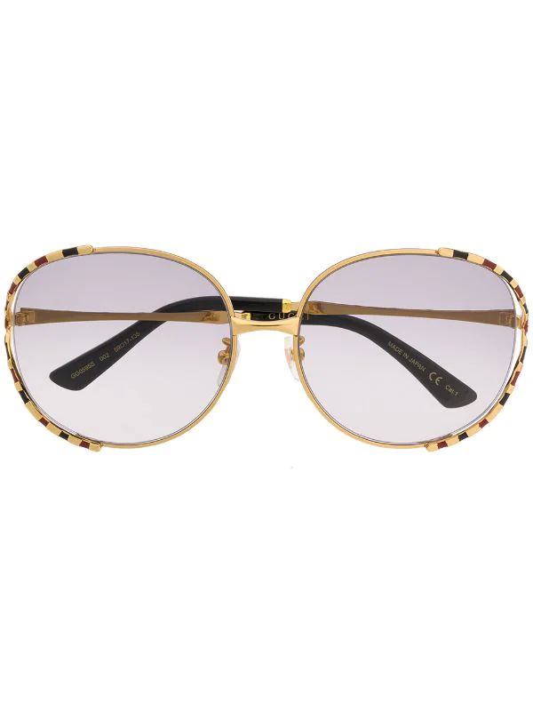 Gucci Eyewear 002 GOLD GOLD GREY Lunettes De Soleil à Monture Ronde Rayée Femme 1 Gucci Eyewear 002 GOLD GOLD GREY Lunettes De Soleil à Monture Ronde Rayée Femme