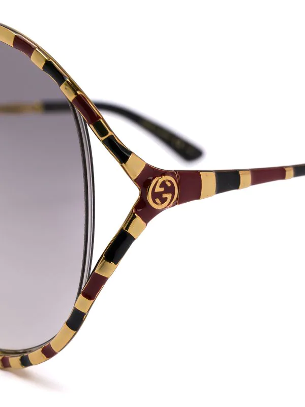 Gucci Eyewear 002 GOLD GOLD GREY Lunettes De Soleil à Monture Ronde Rayée Femme 3 Gucci Eyewear 002 GOLD GOLD GREY Lunettes De Soleil à Monture Ronde Rayée Femme – Image 3