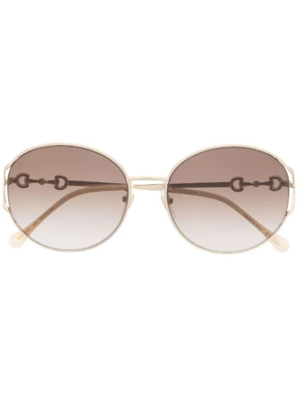 Gucci Eyewear Lunettes De Soleil à Monture Ronde 003 GOLD GOLD BROWN 1 Gucci Eyewear Lunettes De Soleil à Monture Ronde 003 GOLD GOLD BROWN