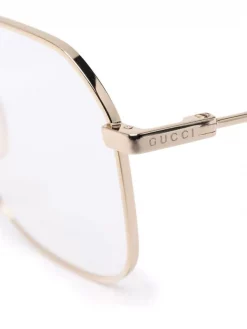 Gucci Eyewear Lunettes De Vue à Monture Géométrique 001 GOLD GOLD TRANSPARENT -Gucci Eyewear Soldes 2022 17787143 38337974 600